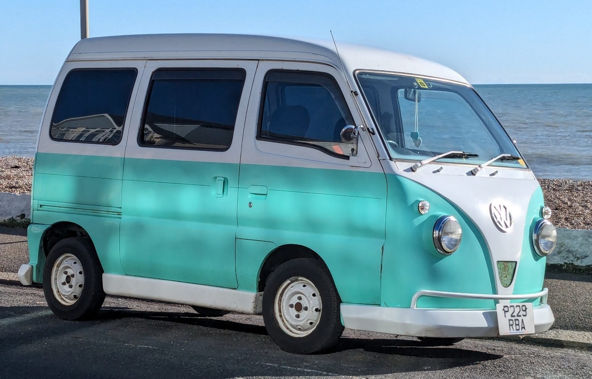 Side view of Ethel - our miniature campervan at the beach